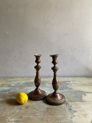 Pair Of Copper Coloured Candlesticks